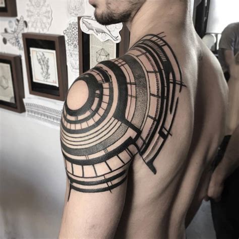 unique geometric shoulder tattoos.